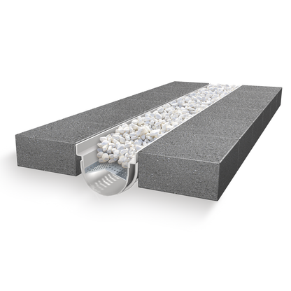 Application d'un caniveau décoratif en SMC DECOSTONE avec tôle perforée en acier galvanisé - Résiste au gel - classe de charge A15 - adapté pour terrasse, jardin et façade.